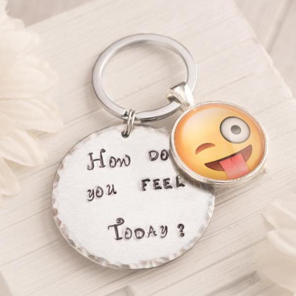 Hand stamped keychain with tongue emoji charm as funny gift for man